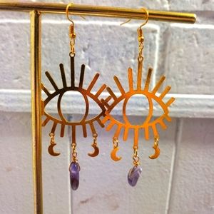 Goldtone eye amethyst drop earrings